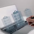 ITSM vendor evaluation Malaysia: IT buyer ticking off an ITSM vendor selection checklist on a laptop