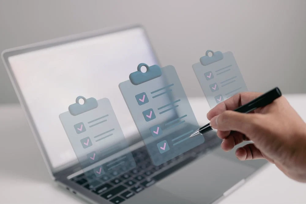 ITSM vendor evaluation Malaysia: IT buyer ticking off an ITSM vendor selection checklist on a laptop